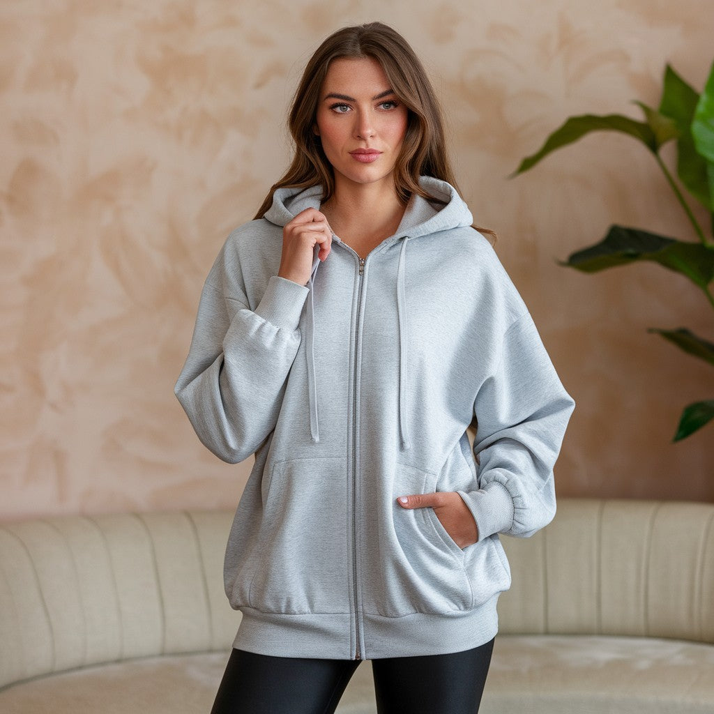 Oversized damesvest met rits en capuchon in grijs – zacht, stijlvol en geschikt voor laagjes